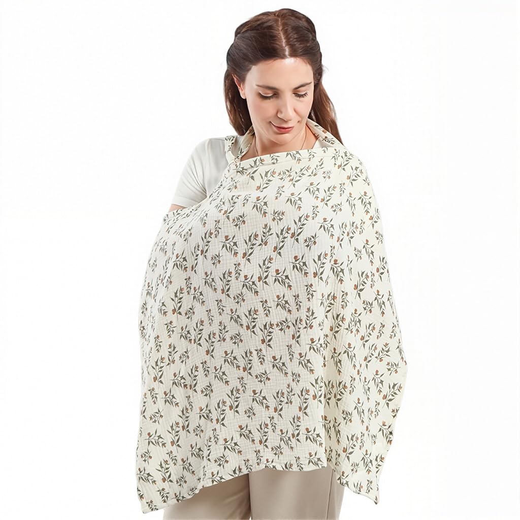 Mother wearing Snowie Soft muslin nursing cover for private breastfeeding and baby feeding comfort